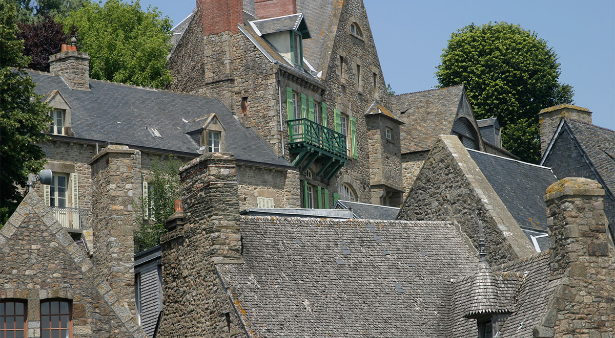 The granite and slate walls and roofs of the village of Mont Saint Michel