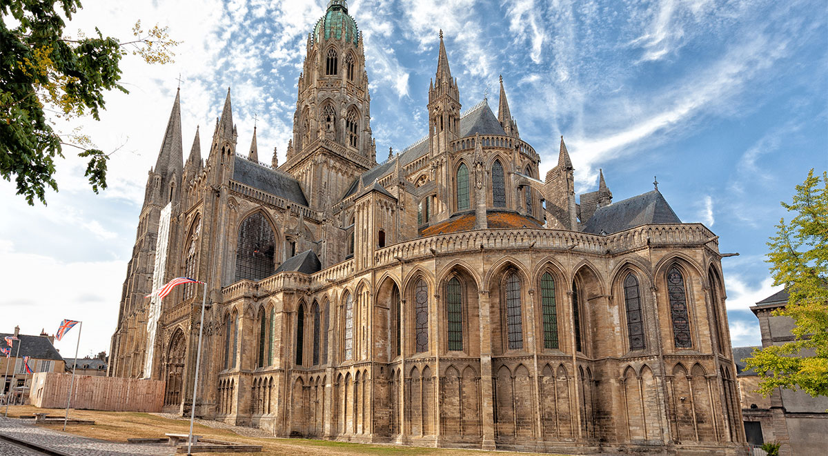 Notre Dame de Bayeux Cathedral combines 11th C. Romanesque towers with 15th C Gothic elements and the curious 19th C. "Bonnet"