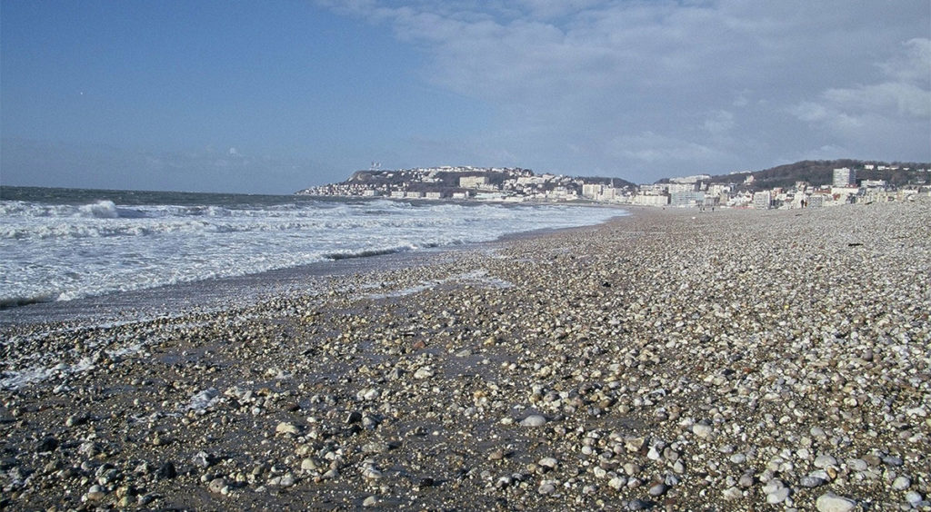 Beach in Le Havre with Sainte Adresse in the distance, often painted by Monet