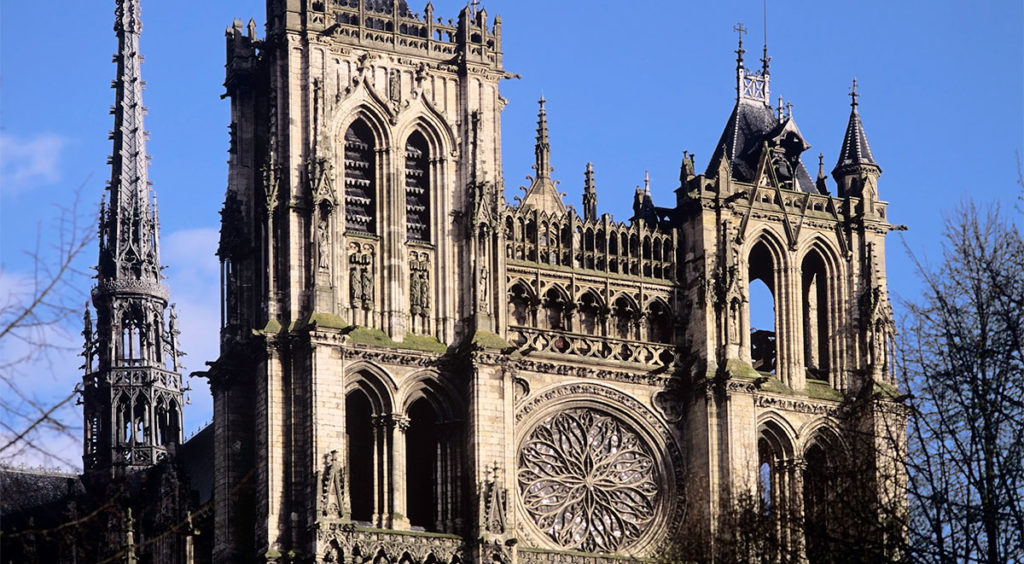The spire of Amiens Cathedral rises 112 meters