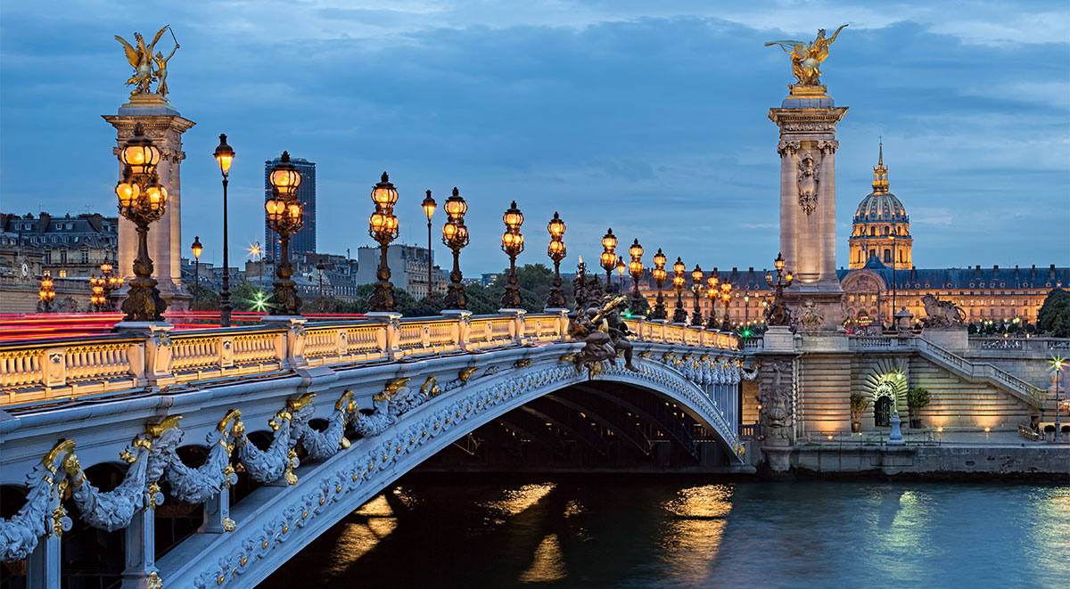 The Alexandre III bridge leading to the Invalides at dusk