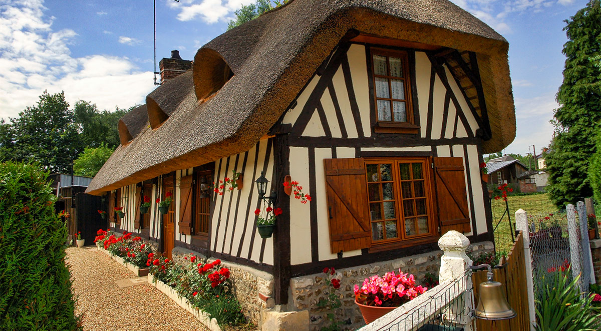 This thatched roof of a half timbered cottage along the thatched roof circuit in Normandy is reputed to have superb thermal insulation characterisitcs